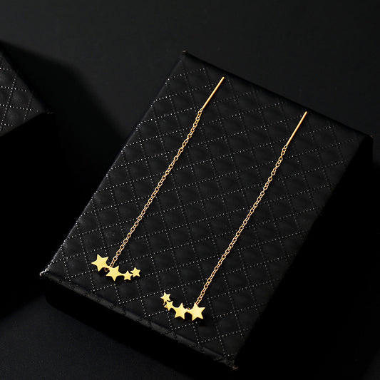 Long Gold Earrings with Star Pendants