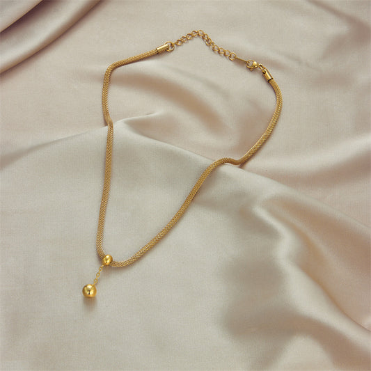 Gold Necklace with a Sphere Pendant