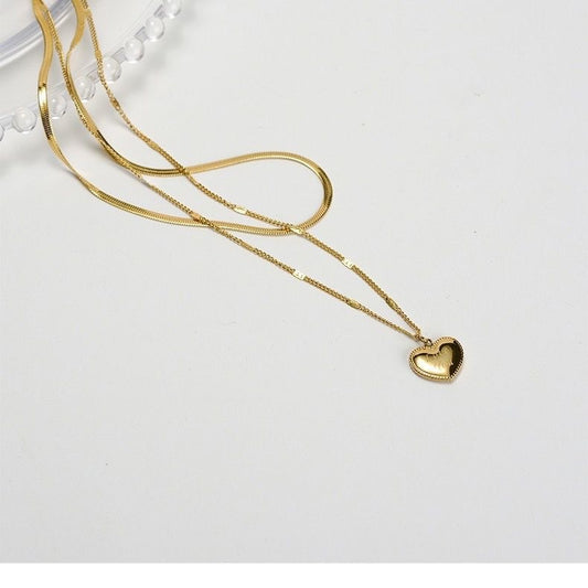 Gold Necklace with a Heart Pendant