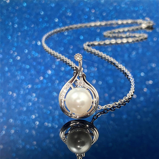 Pearl Pendant with Crystal Accents on a Silver Chain