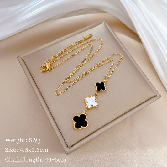 Gold Necklace with Clover Pendants (Black and White Enamel)