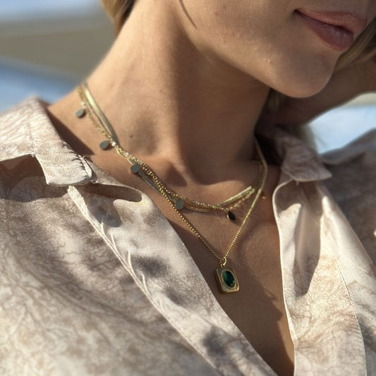 Triple-Layer Gold Necklace with Pendants and Green Stone